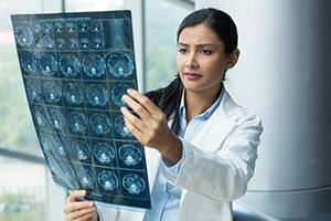 Healthcare woman looking at radiographic image
