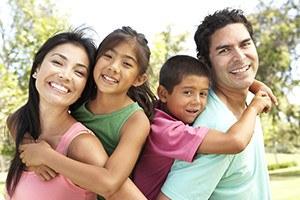 Young family having fun in park